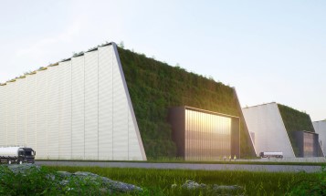 Ett förslag på design av SMR-byggnader. Byggnaderna är utformade som stora enkla volymer med sluttande gröna tak