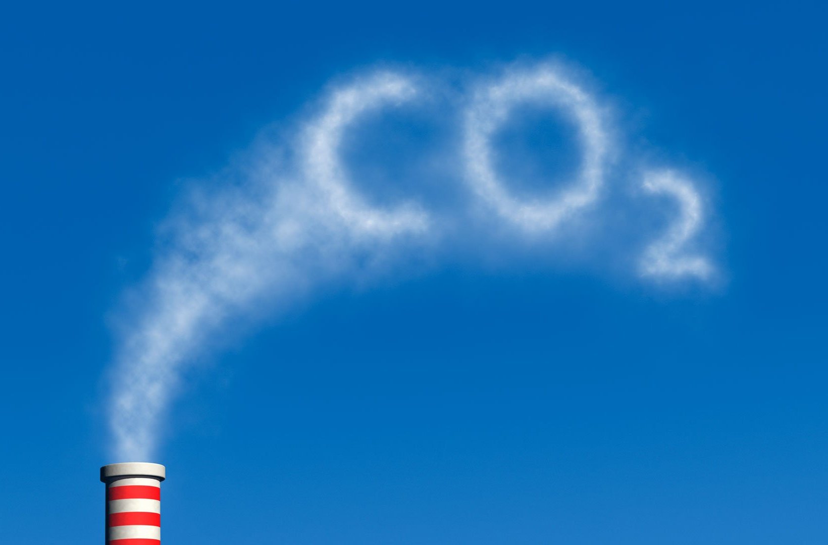 Smoke from a chimney forming the word CO2