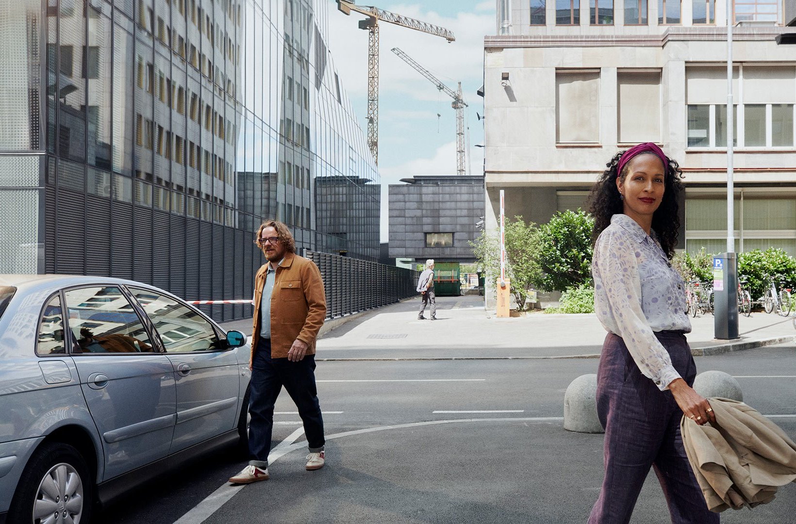 A man and a woman in a city