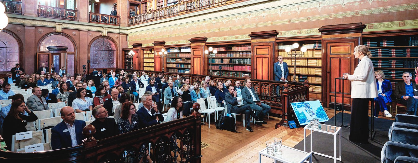 Participants gathered for the climate communication event in the Bibliothèque Solvay