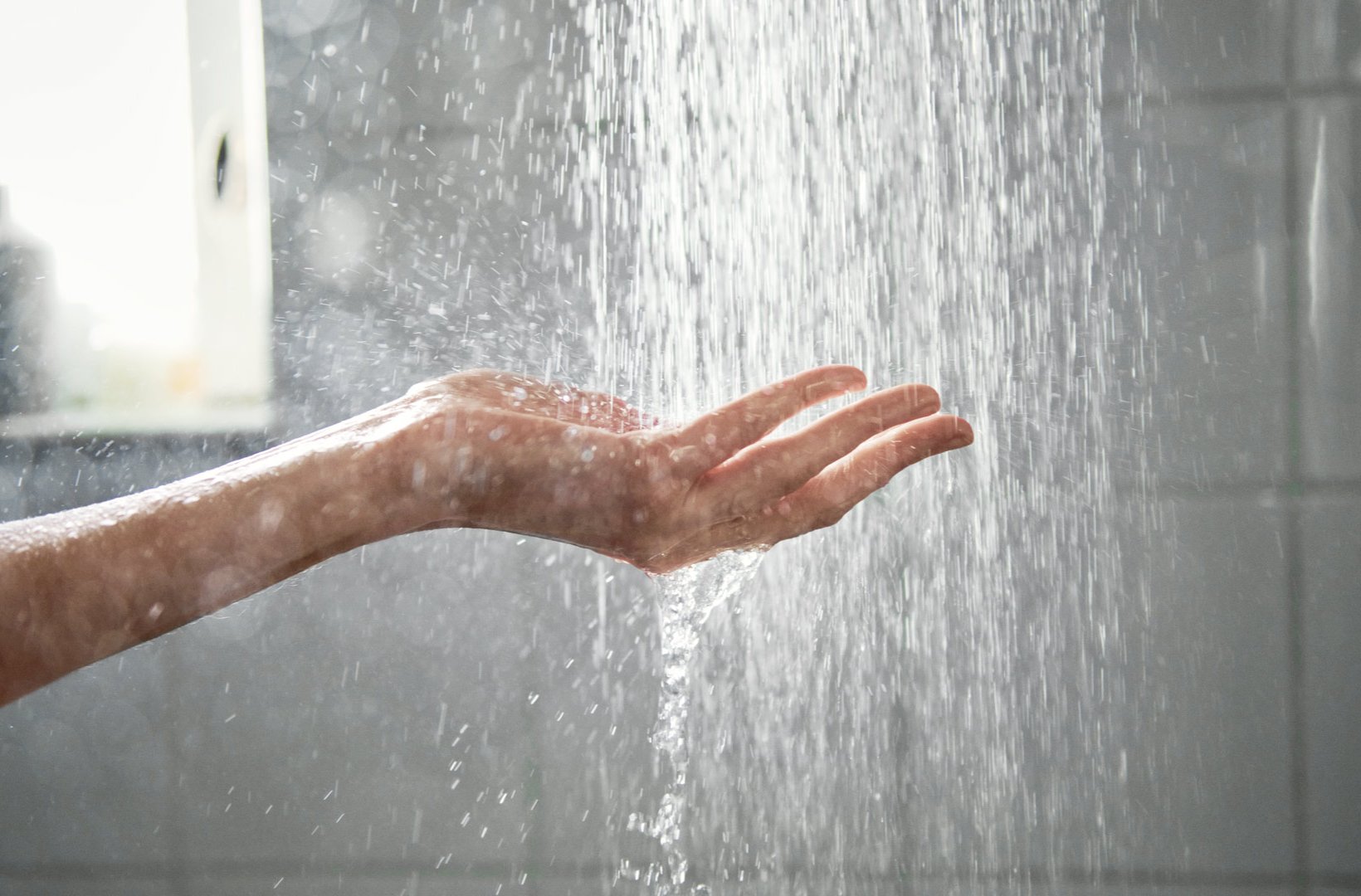 Hand in shower