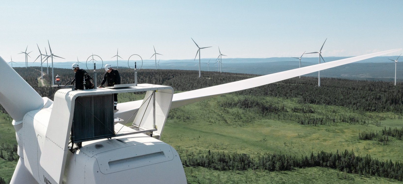 Workers on top of a wind turbine at Stor-Rotliden wind farm