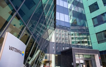 Glass-fronted office building, with a Vattenfall sign in the foreground.
