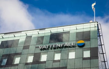 Vattenfall logo on a green-tinted glass office building. Vattenfall logo on a green-tinted glass office building.
