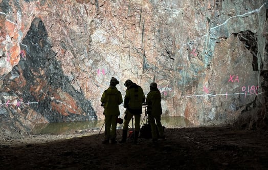 Three construction workers at the site of the spent nuclear fuel repository.