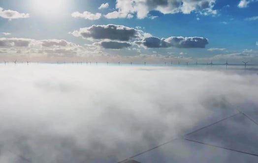 Aerial view of Vattenfall's Prinses Ariane onshore wind farm in morning fog. Aerial view of Vattenfall's Prinses Ariane onshore wind farm in morning fog.