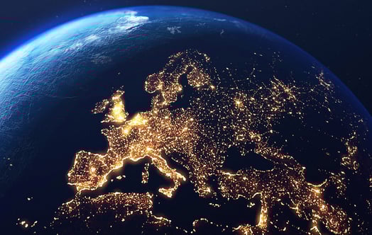 A view of Earth from space showing Europe at night, illuminated by thousands of city lights, with the curve of the planet visible against the dark sky. A view of Earth from space showing Europe at night, illuminated by thousands of city lights, with the curve of the planet visible against the dark sky.