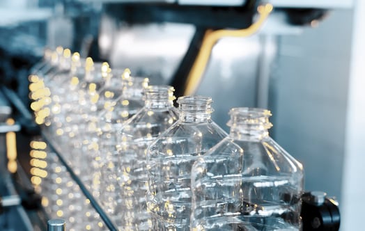 A row of plastic bottles