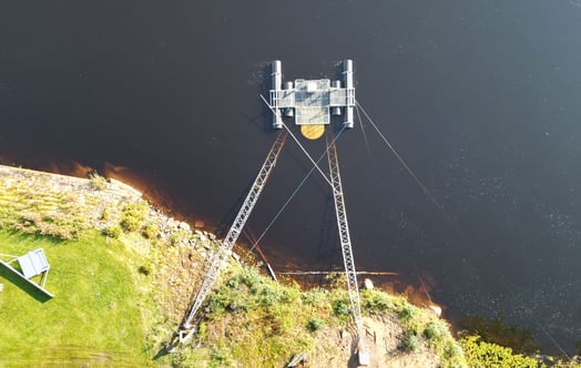A large pump guiding fish past a hydro power plant. Photo: Jesper Myhr