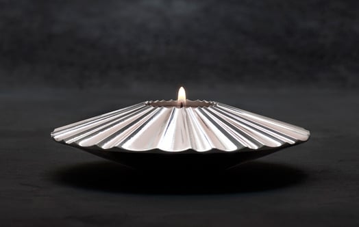 Steel candle holder, made by SSAB using HYBRIT technology.