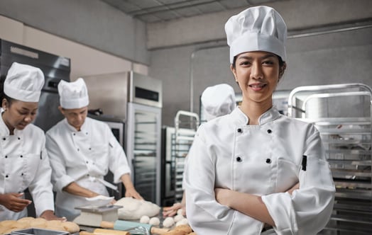 A chef in a commercial bakery