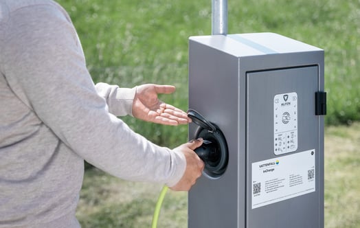 A person using an InCharge charging station