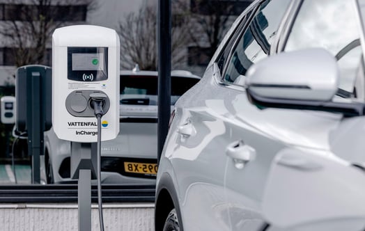 A silver electric car at an InCharge charging point.