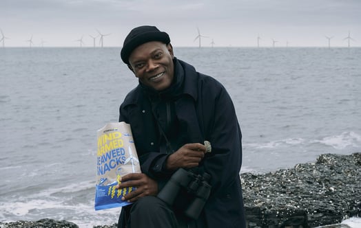 Actor Samuel L. Jackson with a bag of seaweed snacks