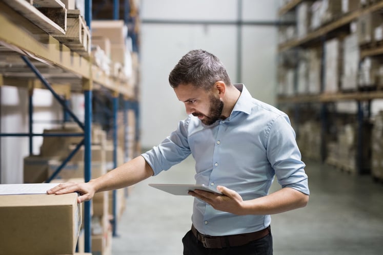 A man in a warehouse