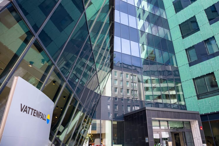 Glass-fronted office building, with a Vattenfall sign in the foreground. Glass-fronted office building, with a Vattenfall sign in the foreground.