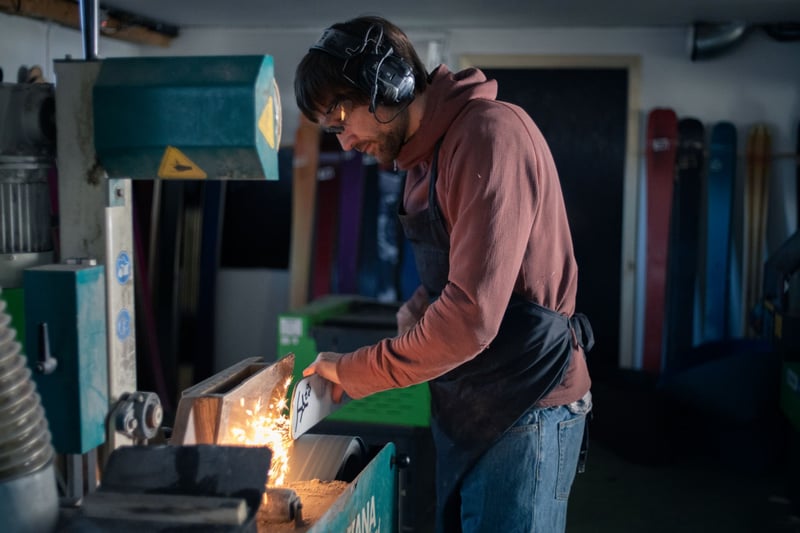 Endre Hals, founder of EVI skis, making a ski in his workshop