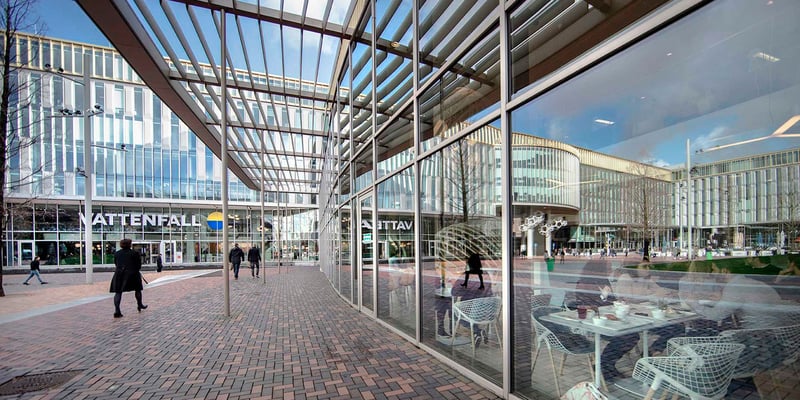 Glass-covered walkway outside Vattenfall's modern office building in Amsterdam. Glass-covered walkway outside Vattenfall's modern office building in Amsterdam.