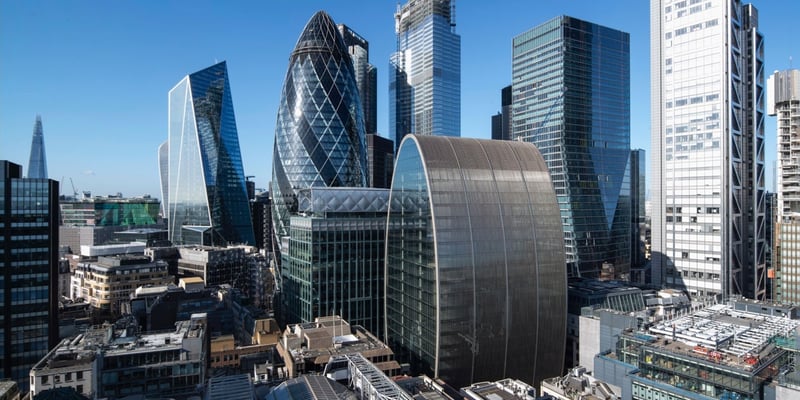 Modern skyscrapers and office buildings in a dense city business district under clear blue skies. Photo: James Reid. Modern skyscrapers and office buildings in a dense city business district under clear blue skies. Photo: James Reid.