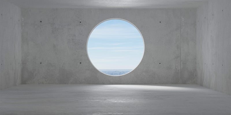 Concrete room with a circular window Concrete room with a circular window