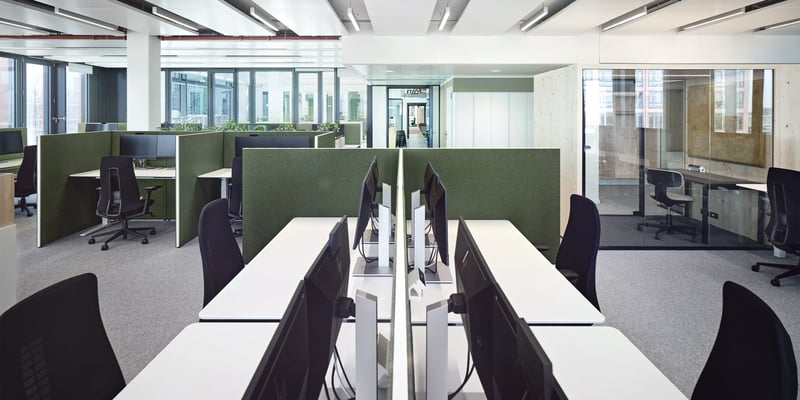 Desks and chairs in an office Desks and chairs in an office