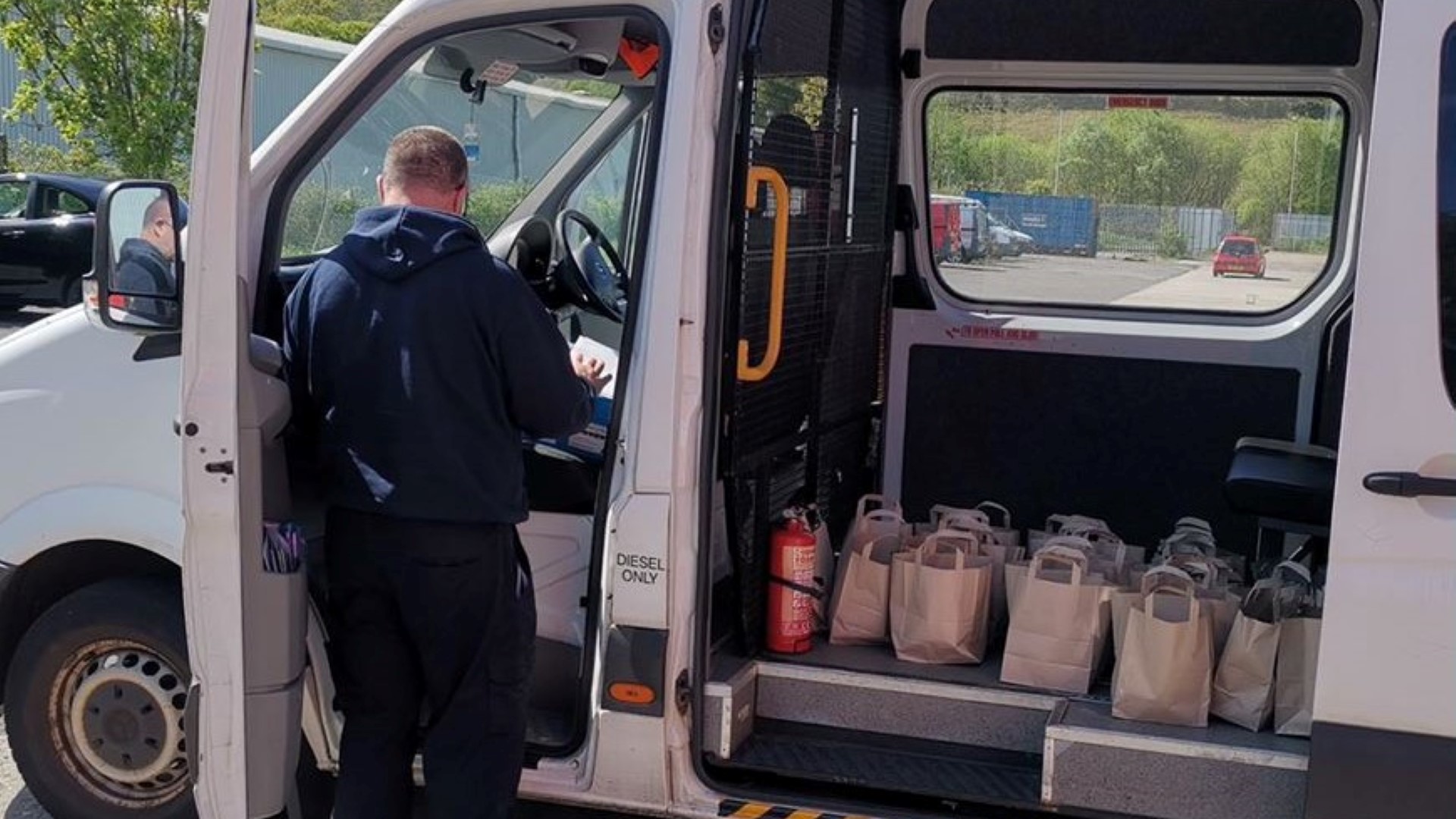 Volunteers delivering hampers during the COVID-19 pandemic