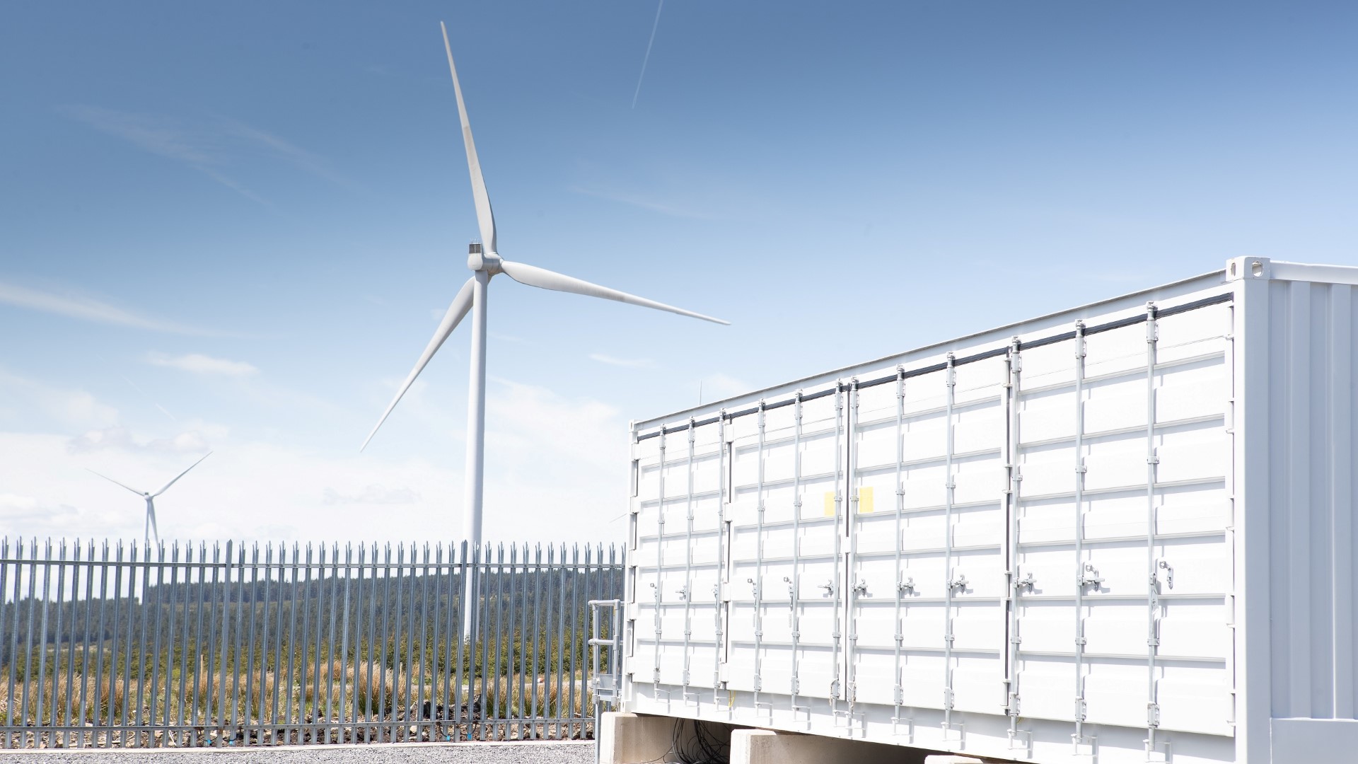 battery@pyc with Pen y Cymoedd Wind Farm in the background