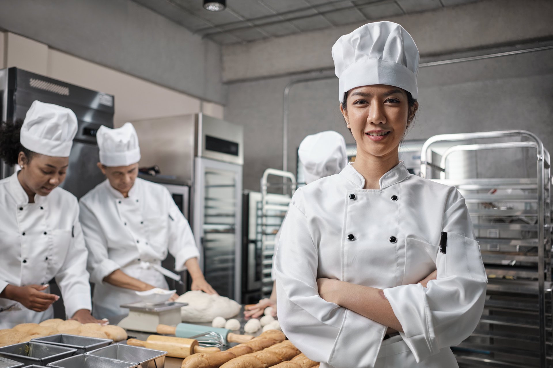 A chef in a commercial bakery