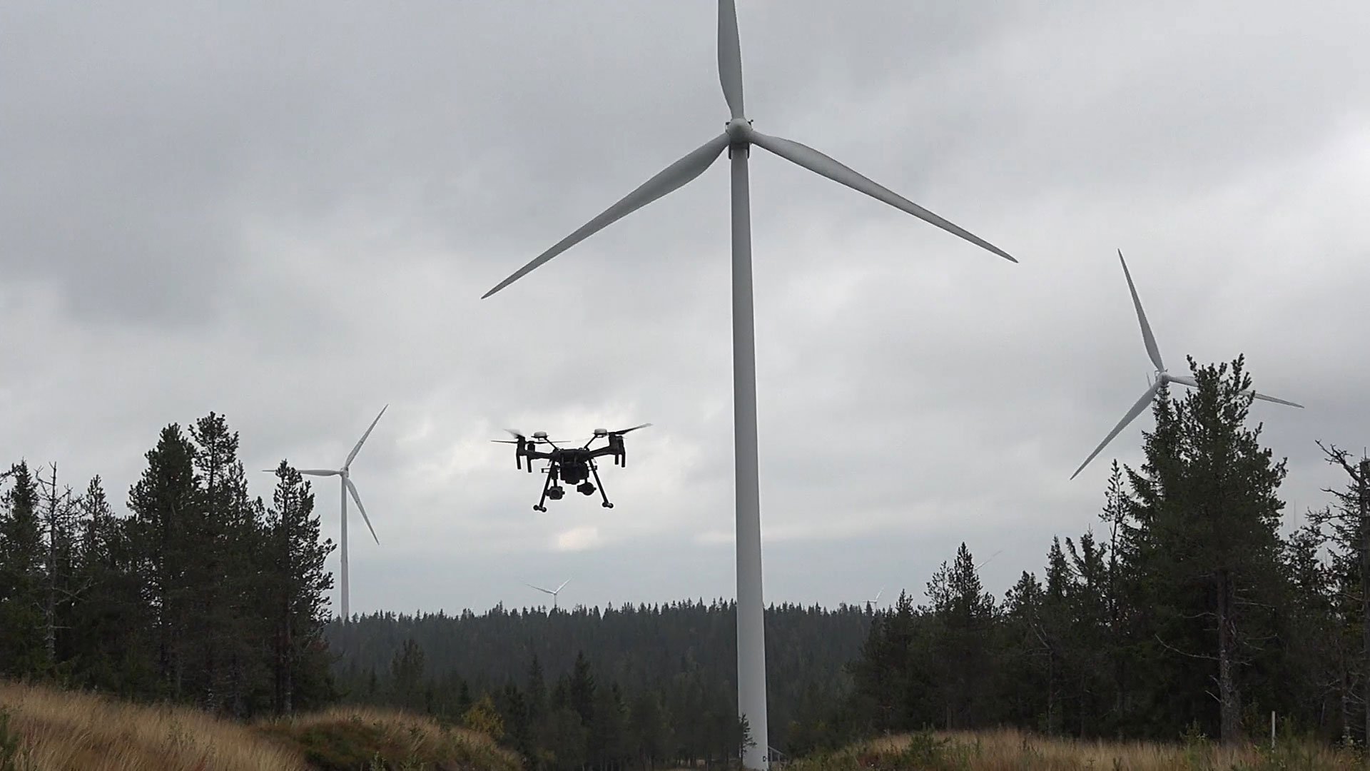Drone inspecting wind farms
