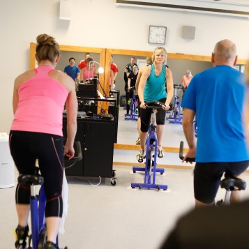 People exercising in a spin class