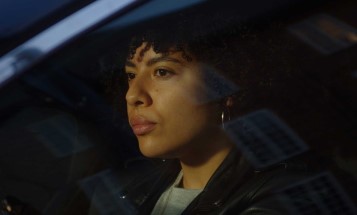 A woman sitting in a car