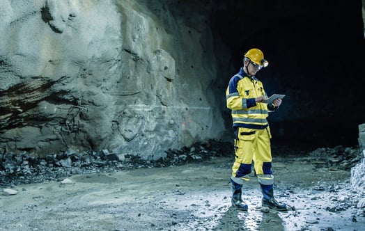 Man in yellow overalls and helmet at Boliden's Kristineberg mine