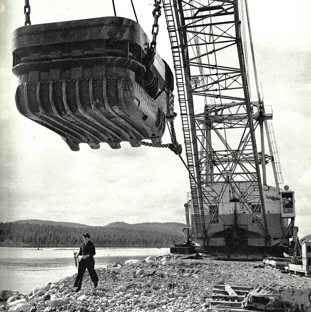 A man and a crane at Umeälven. Photo: Lennart Nilsson