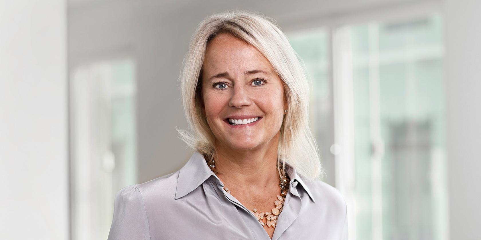 Karin Lepasoon, Senior Vice President, Group Communications