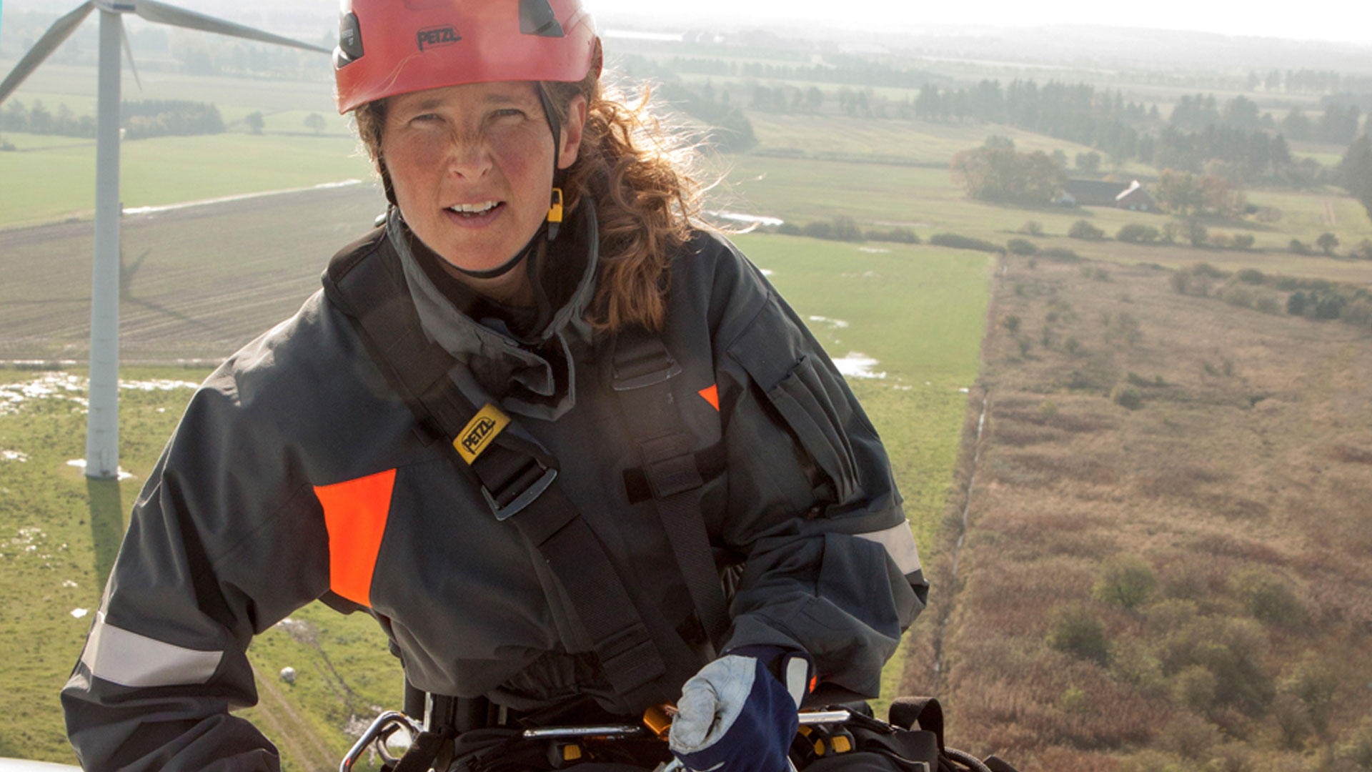 Rikke Juul Balle sitting on a turbine