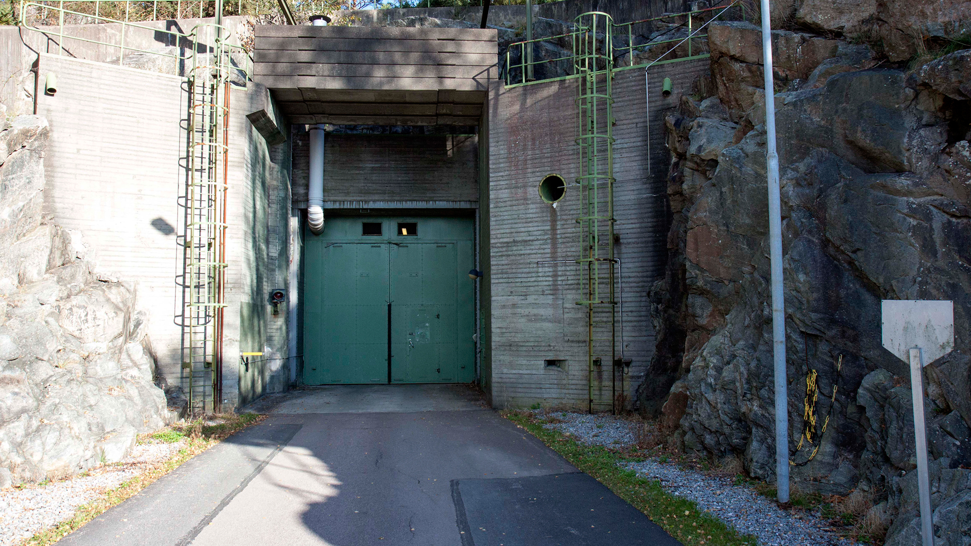 The green steel doors of the hidden power plant in Stenungsund, Sweden