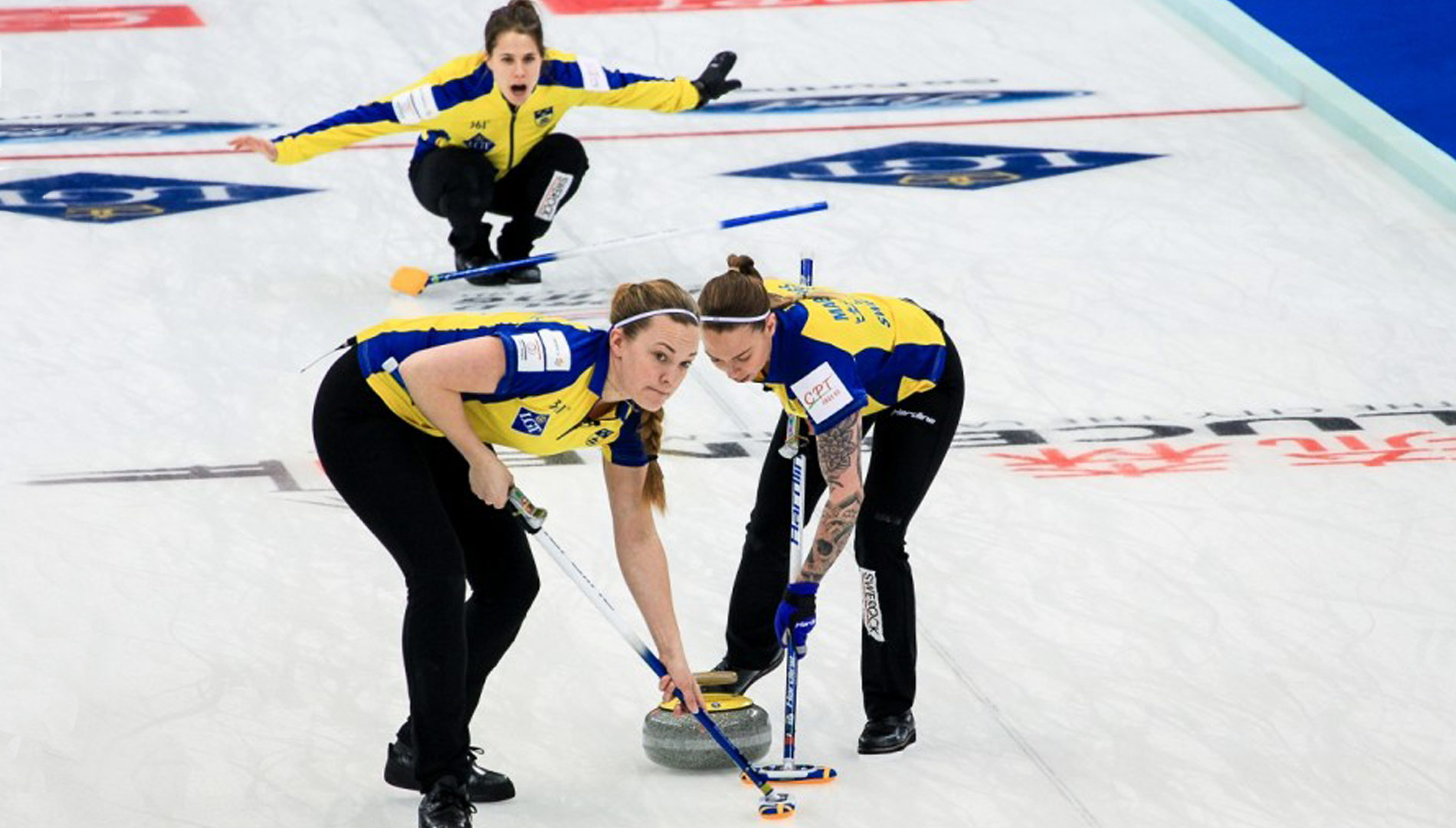 Agnes playing curling with her team. Photo: World Curling Federation