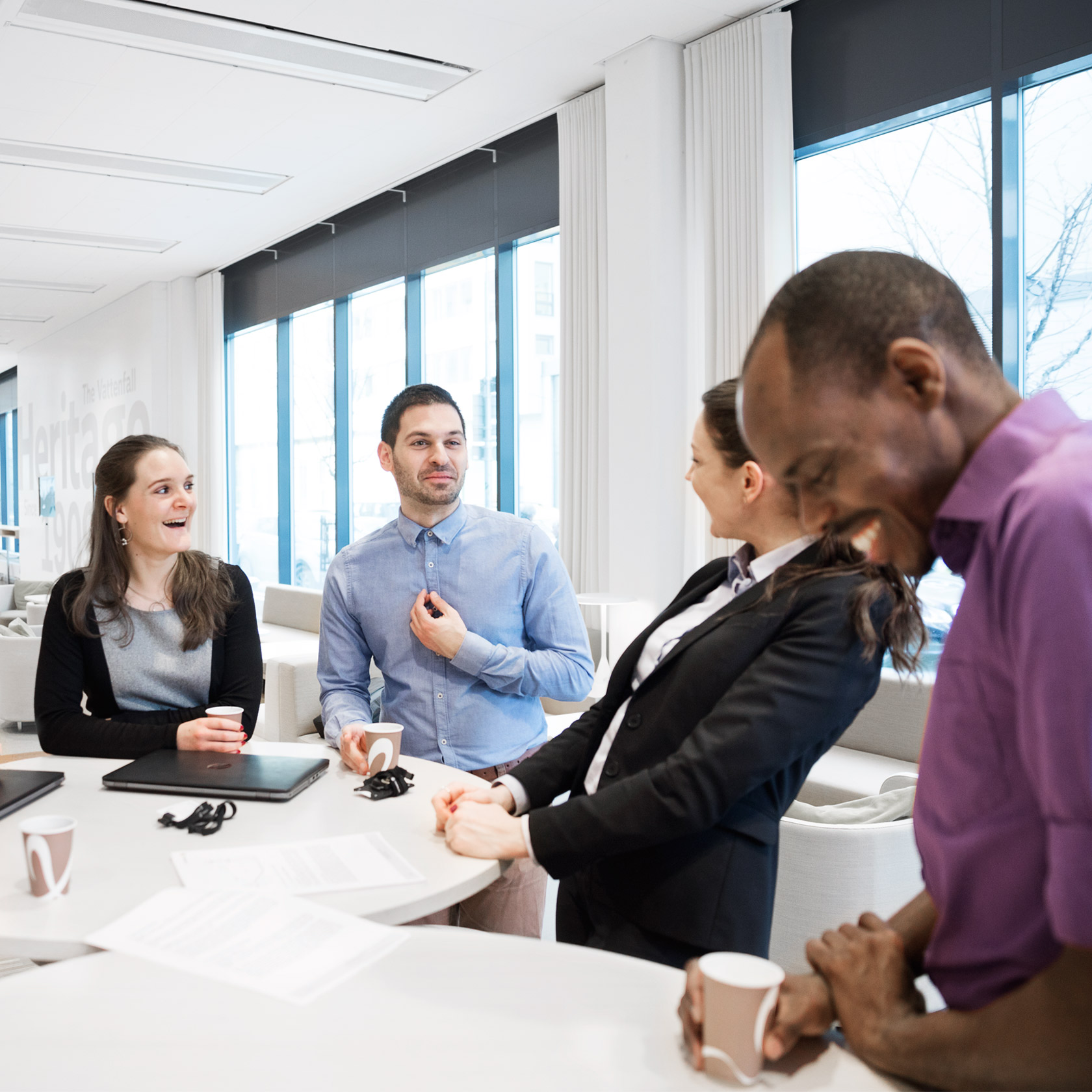 Employees sharing a laugh