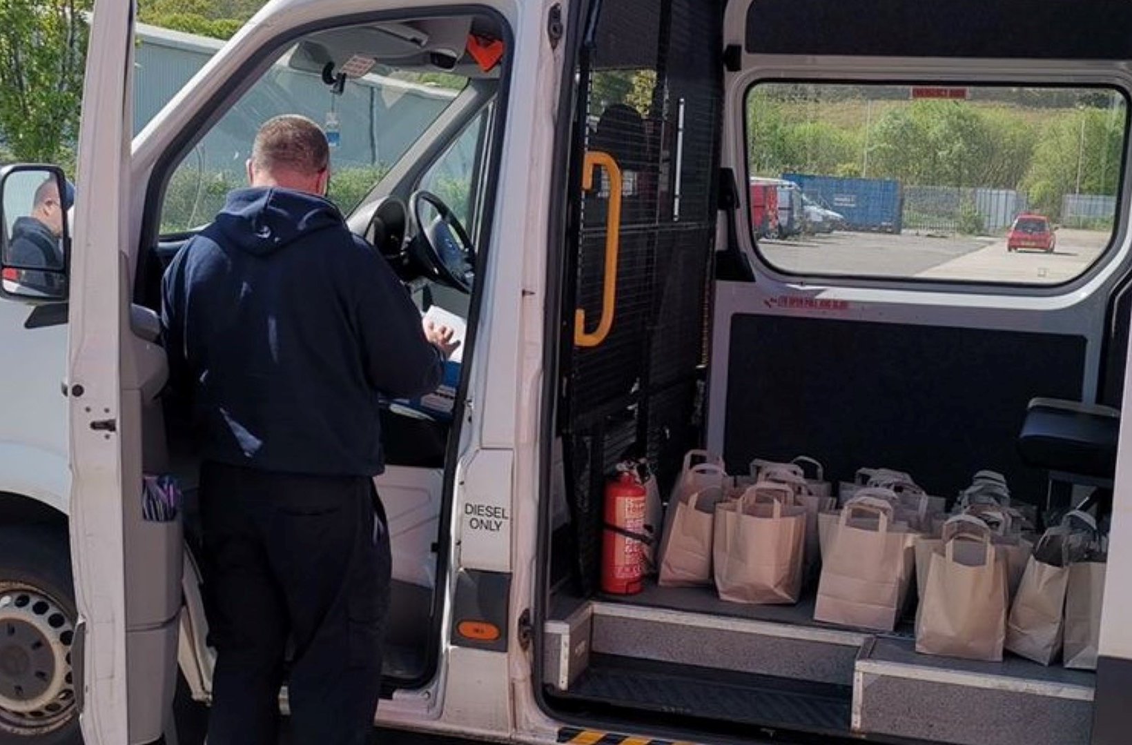 Volunteers delivering hampers during the COVID-19 pandemic