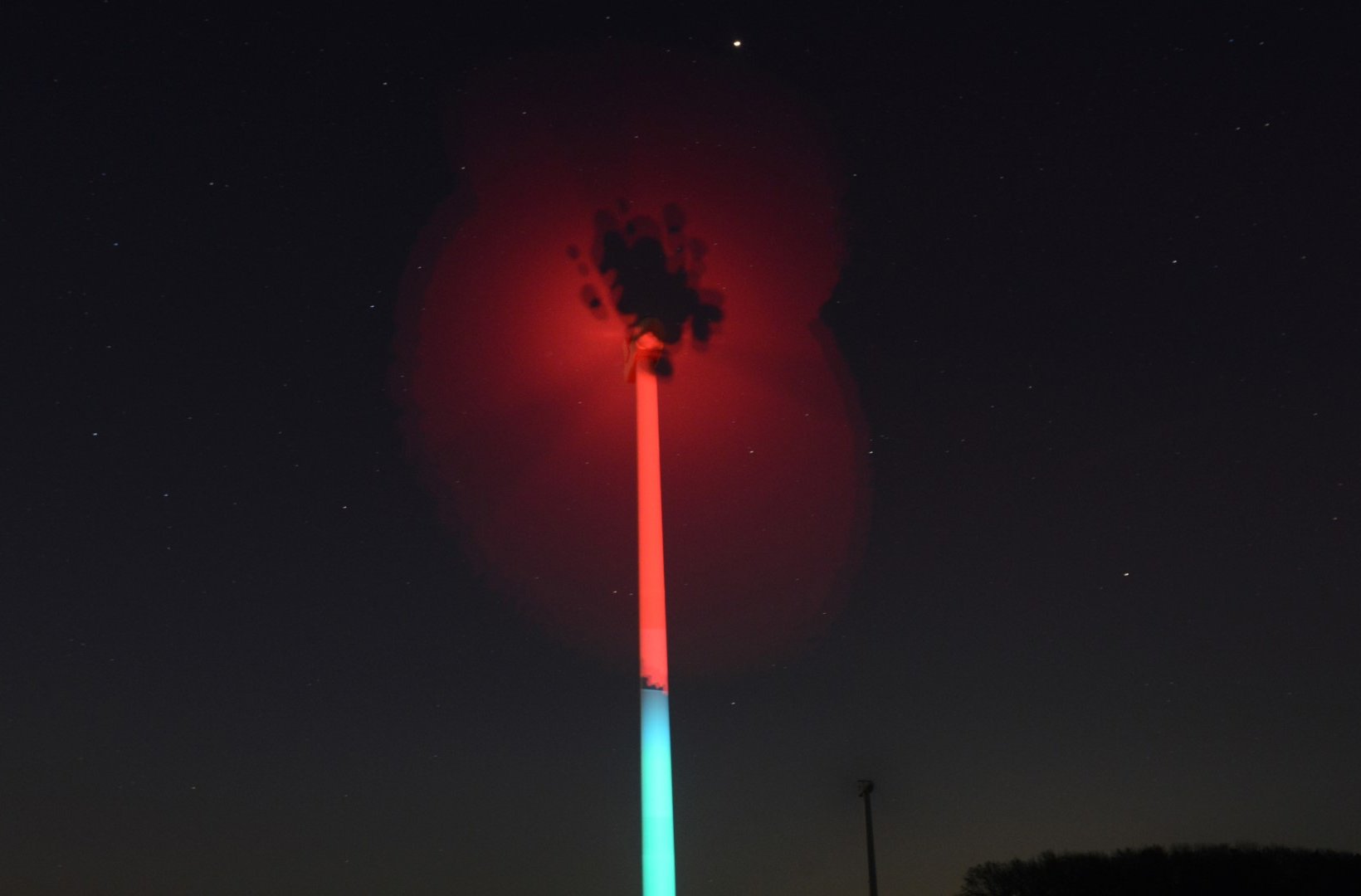 Turbine at Swinford Wind Farm in Leicestershire transformed into a giant poppy to promote the 2020 Royal British Legion Poppy Appeal