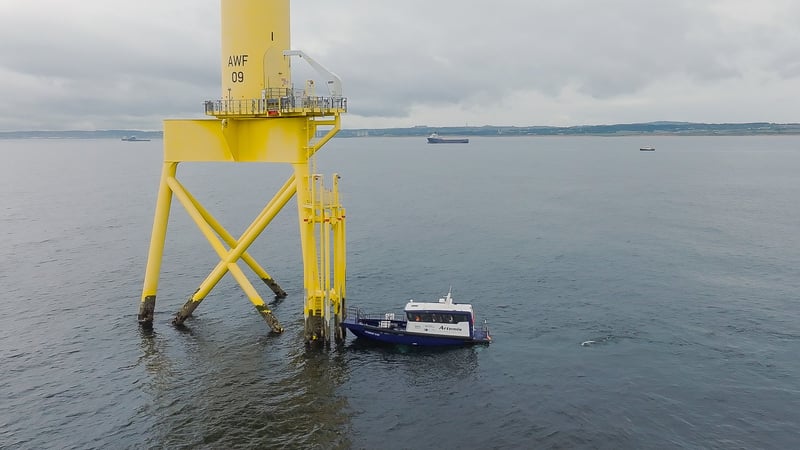 Image of the CTV docking at the bollard of a wind turbine Image of the CTV docking at the bollard of a wind turbine